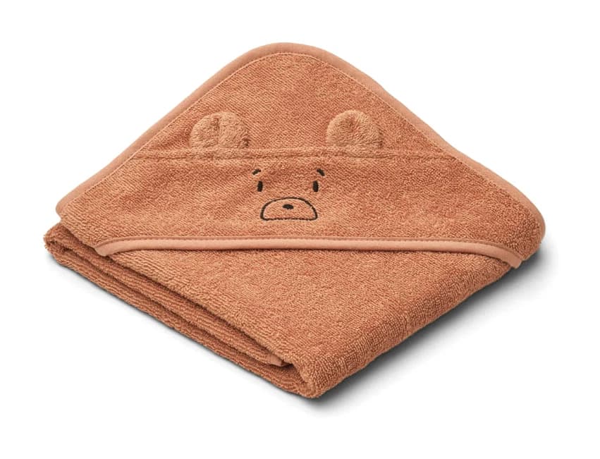 Cape de bain en éponge terracotta, une tête d’ourson sur la capuche